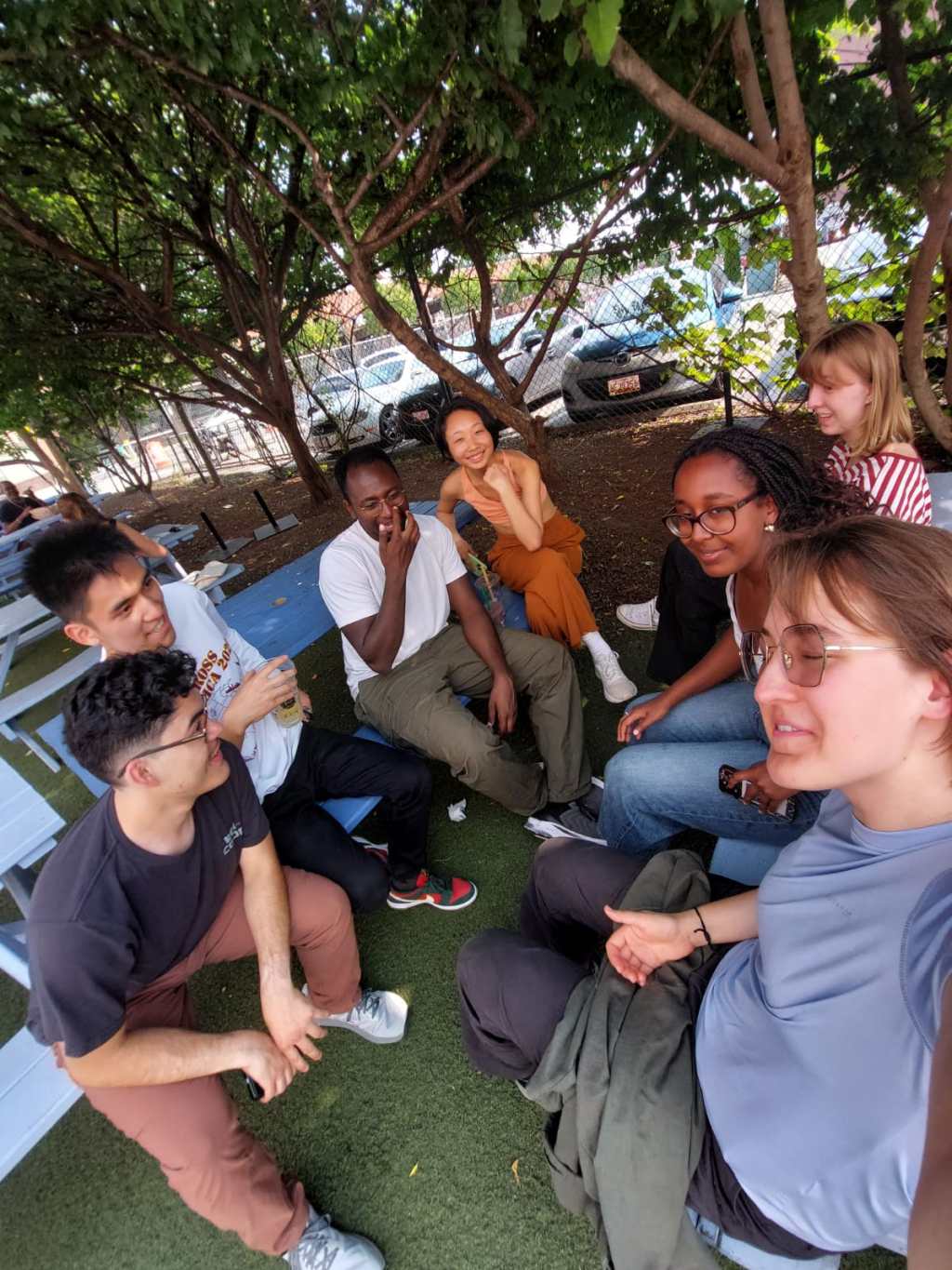 ppl sitting in green area