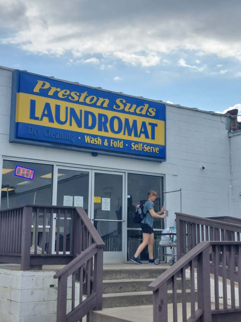 Sarah bringing our laundry back